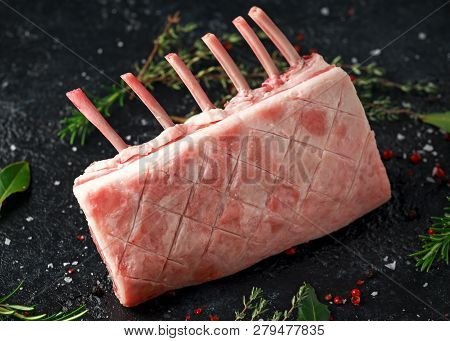 Raw Fresh Rack Of Lamb With Green Herbs.