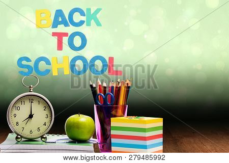 Composite Of Back To School Text With School Materials And Bright Background