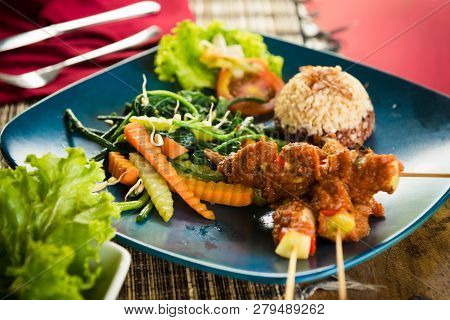 Organic Food Of Bali. Served With Sauce And Salads.
