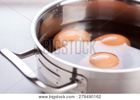 Image Of Raw Eggs In A Metal Pan