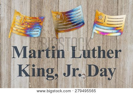 Martin Luther King Day Message Text With Usa Patriotic Metal Flags On A Weathered Wood
