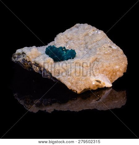 Natural Cavansite Stone On Substrate On Black Background With Reflection