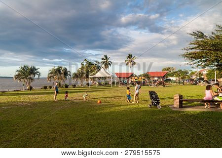 St Laurent Du Maroni, French Guiana - August 4, 2015: People On A Riverbank Park In St Laurent Du Ma