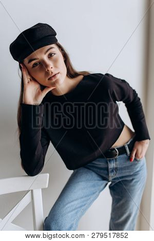 Beautiful Girl In A Black Cap, Black Golf, Blue Jeans! Natural Light, Smart Casua, Street Casual