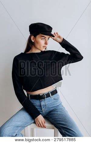 Beautiful Girl In A Black Cap, Black Golf, Blue Jeans! Natural Light, Smart Casua, Street Casual