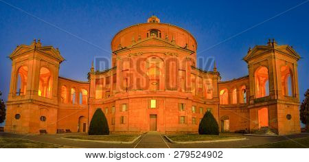 Panorama Of Courtyard Sanctuary Of Madonna Di San Luca Illuminated At Blue Hour. Facade Of Basilica 