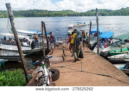 Oiapoque, Brazil - August 1, 2015: Small Boats On Oiapok Oiapoque Or Oyapock River In Oiapoque Town.