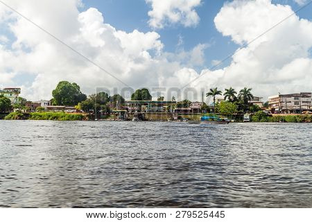 Oiapoque, Brazil - August 1, 2015: Rierside Buildings Of Oiapoque Town On Oiapok Oiapoque Or Oyapock