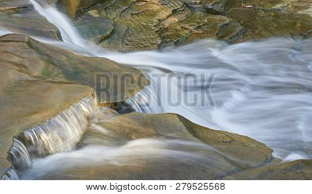 Waterfall/rapids On Chagrin River In The Village Of Chagrin Falls, Ohio Usa