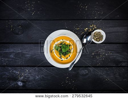 Pumpkin Soup With Jusai And Fried Cilantro.