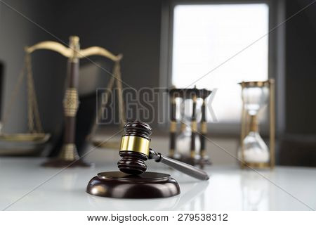 Lawyers Office. Gavel And Scale  On The White Table.