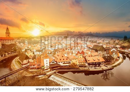 Aerial View Panorama Of The Old Town Of Cesky Krumlov In South Bohemia, Czech Republic During Sunset