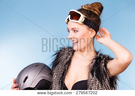 Winter Sport Activity Concept. Atractive Smiling Woman Wearing Black Bra, Ski Goggles And Furry Wais