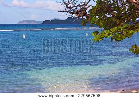 Sandy Beach With Shallow Quiet Waters And Terrific View On St John And Smaller Virgin Islands. Sea G