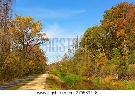 C&o Canal National Historic Park In Autumn. Colorful Fall Foliage Of Deciduous Trees Along The Park 