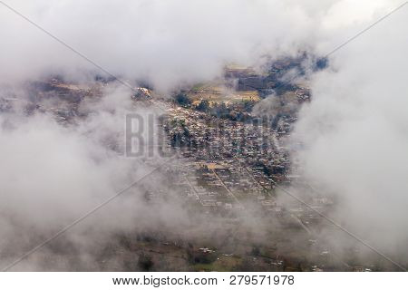 Aerial View Of Celendin Through The Clouds, Peru