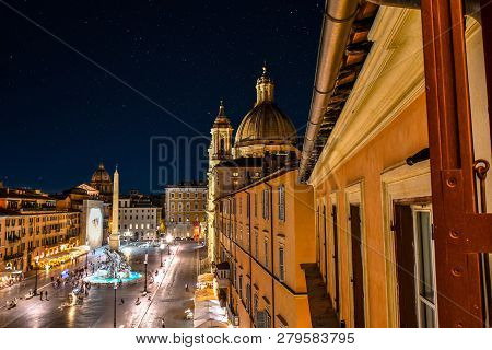 Rome, Italy - September 30 2018: The Illuminated Dome Of Sant Agnese In Agone, Or St. Agnes Cathedra