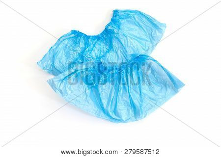 Blue Medical Shoe Covers On White Background. Hygiene And Cleanliness In Medical Institutions