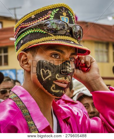 Latacunga, Ecuador - September 22, 2018 - Young Men Dress In Decorated Black Face To Celebrate Afric