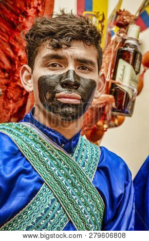 Latacunga, Ecuador - September 22, 2018 - Young Men Dress In Decorated Black Face To Celebrate Afric