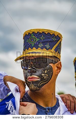 Latacunga, Ecuador - September 22, 2018 - Young Men Dress In Decorated Black Face To Celebrate Afric