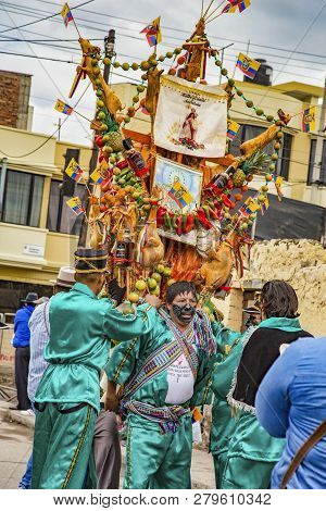Latacunga, Ecuador - September 22, 2018 - The Strongest Men Of Each Neighborhood Carries A Pig And A