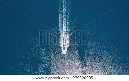 Yacht On The Sea From Top View. Aerail View At The Boats. Sea Background From Top View. Summer Seasc