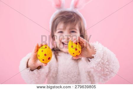 Portrait Of A Little Girl With Bunny Ears W Easter Eggs