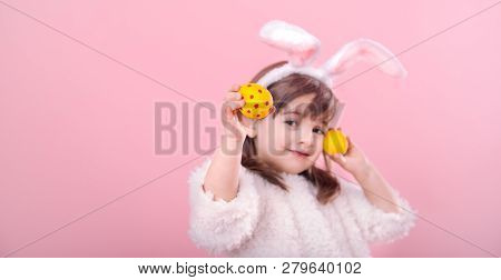 Portrait Of A Little Girl With Bunny Ears W Easter Eggs