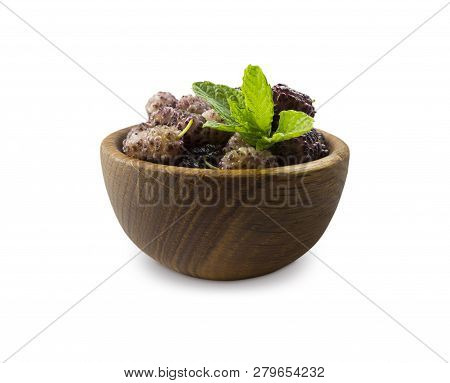 Mulberries In A Wooden Bowl With Copy Space For Text. Black And Purple Mulberry On White Background.