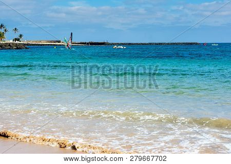 View Of Playa De Las Cucharas Beach In Costa Teguise, Lanzarote, Spain, Turquoise Waters, Selective 