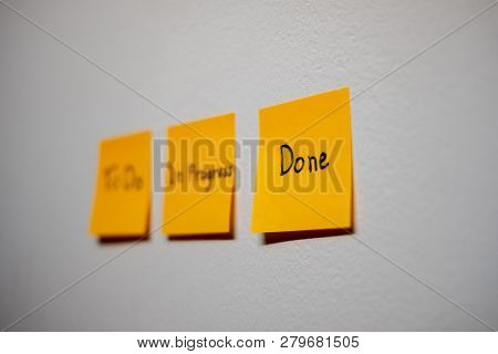 Monitor Task Of Work Concept, To Do, In Progress, Done Note Reminder Yellow Sticker Or Post Note On 