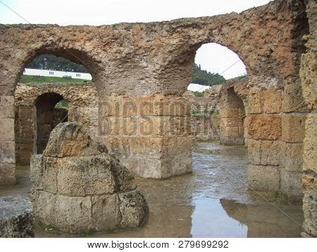 Carthage, Tunisia - April 12, 2018: Ruins Of Bathhouse Of Carthage And View To Mediterranean Sea, Tu