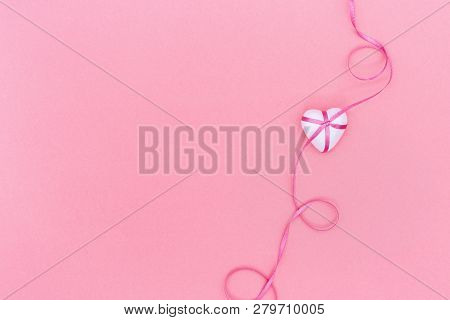 Greeting Card For Valentine’s Day, Birthday, Womans Day With Hearts With Ribbon. Pastel Color Backgr