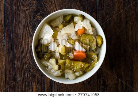 Mix Of Turkish Pickles With Hot Green Pepper, Cabbage, Sauerkraut, Carrot And Cucumber In Bowl.