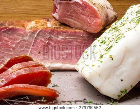Chunks Of Salted Bacon Jerky Healthy Food With Pranami Spices And Herbs. Fat, Lard, Ham,