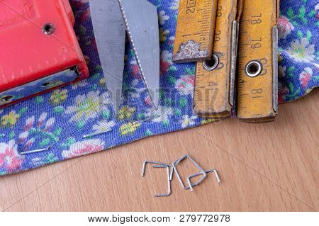 Tacker And Staples Used To Upholster Furniture. Accessories For Employees In The Carpentry Shop. Lig