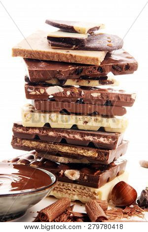 Chocolate Bars On Table With Chocolate Tower.