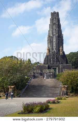 Miyazaki, Japan - November 5, 2018: Peace Tower, Heiwadainoto, a tower constructed of stones sent from all around Asia in Heiwadai Park, Miyazaki