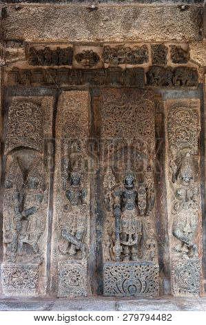 Belur, Karnataka, India - November 2, 2013: Chennakeshava Temple. Brown Wall Stone Panel Sculpture O