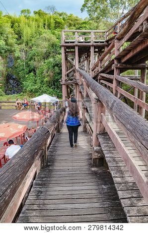 Curitiba - Pr, Brazil - December 16, 2018: People Walking On The Wooden Path To The Deck Of The Tang