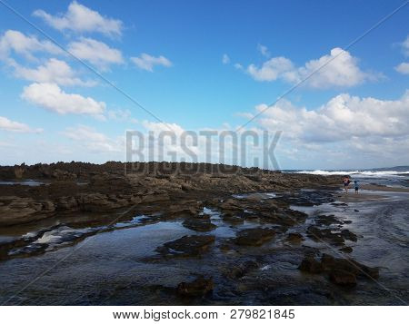 Rocky Shore At Beach With Tidepools In Isabela, Puerto Rico