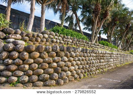 Hachijojima, Tokyo, Japan at the tamaishigaki walls built by exiled convicts.