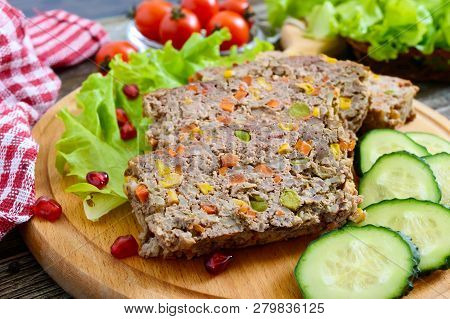 Liver Casserole. Useful Dish From The Liver. Freshly Baked Pork Liver Souffle With Rice And Vegetabl