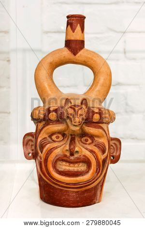 Yekaterinburg, Russia - January 17, 2019: Ancient Ceramic Vessel Depicting Portrait Of Warrior-fox, 