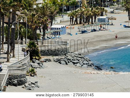 Almunecar, Spain - June 8, 2018 View Of The Tourist Town Of Almunecar On The Costa Tropical In Spain