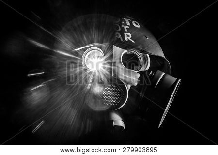 Art Picture Of A Military Gas Mask On A White Brick Wall With Shadows With Flash With The Inscriptio