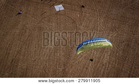 Paraglider Flies Over Fields. High Altitude. The Athlete Turns The Thermal Current. Rise Up. Weather