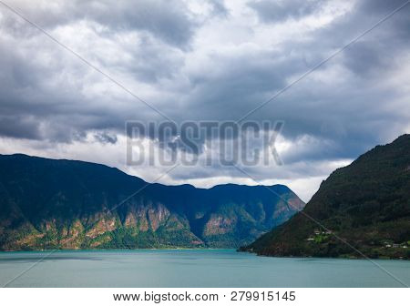 Stormy sky over the Lustrafjord or Lustrafjorden fjord, branch of greater Sognefjord or Sognefjorden (the King of the Fjords), Luster municipality, Sogn og Fjordane, Norway, Scandinavia