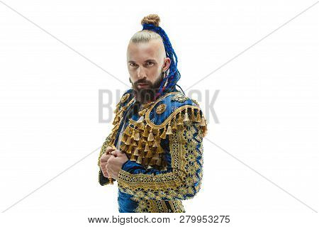 Torero In Blue And Gold Suit Or Typical Spanish Bullfighter Isolated Over White Studio Background. T